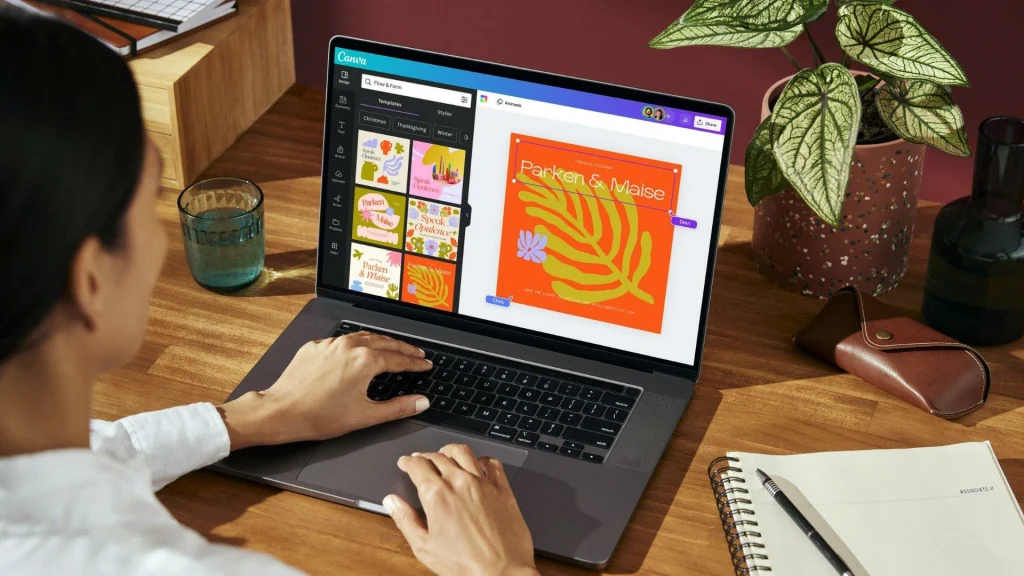 Do You Need to Draw for Graphic Design? A Beginner’s Guide 2 Sketchbook with rough logo concepts beside a computer displaying digital graphic designs
